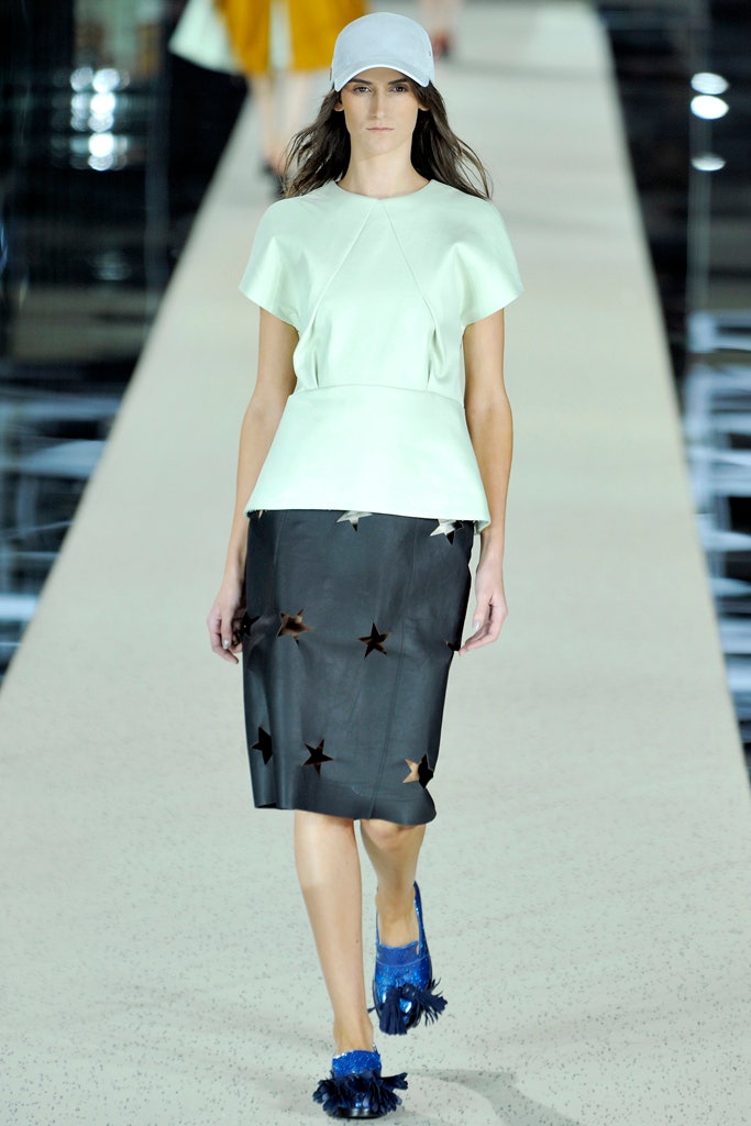 light green top with black skirt