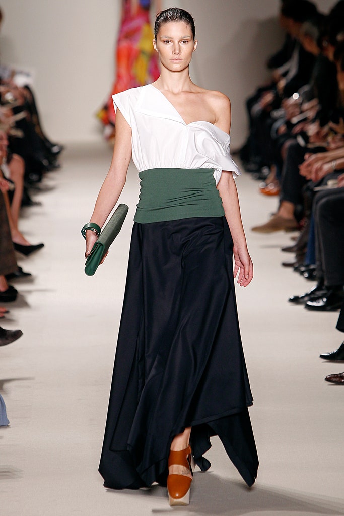 white asymmetric top and black tiered skirt