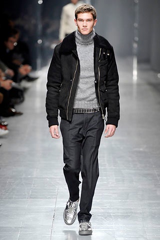 black jacket gray sweater tailored pants