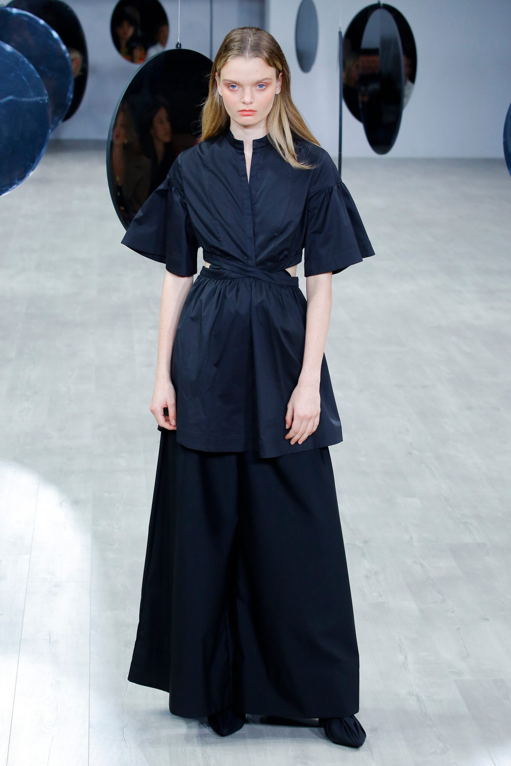 black relaxed top and wide-leg pants