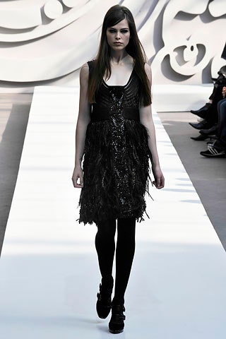 black ruffled sleeveless mini dress