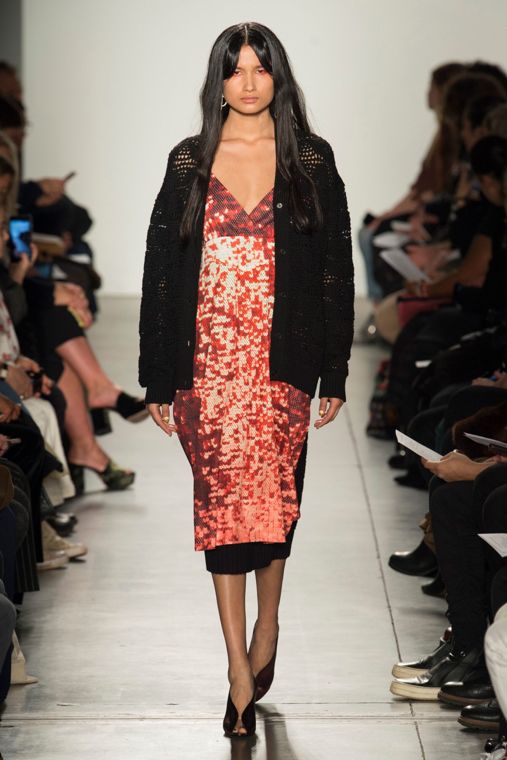 red sequined midi dress with oversized cardigan