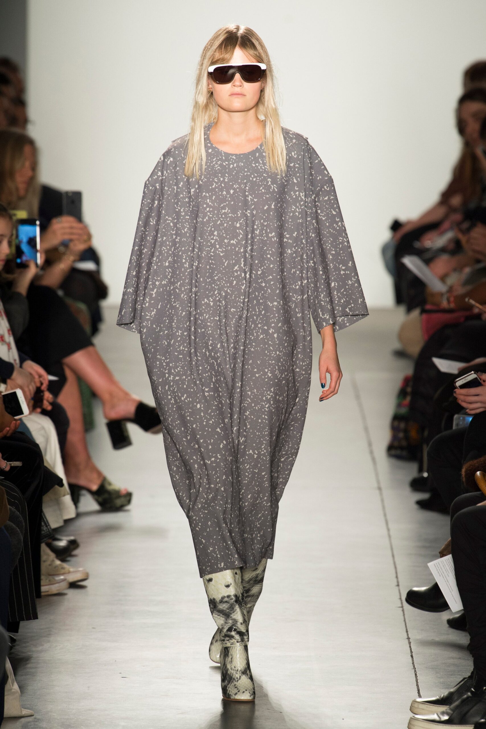 An oversized gray dress with a collared neckline and printed design.