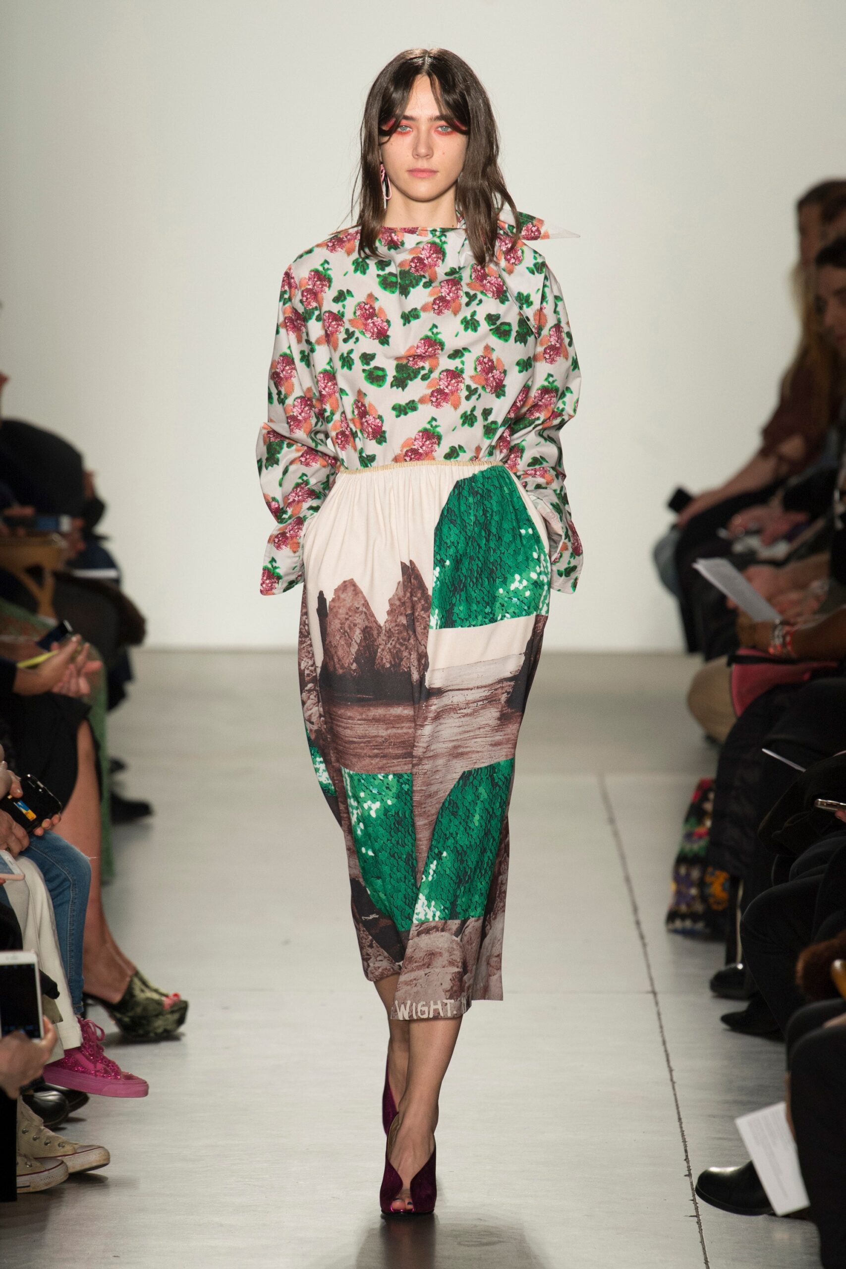 A relaxed multicolor printed dress with long sleeves and a collared neckline.