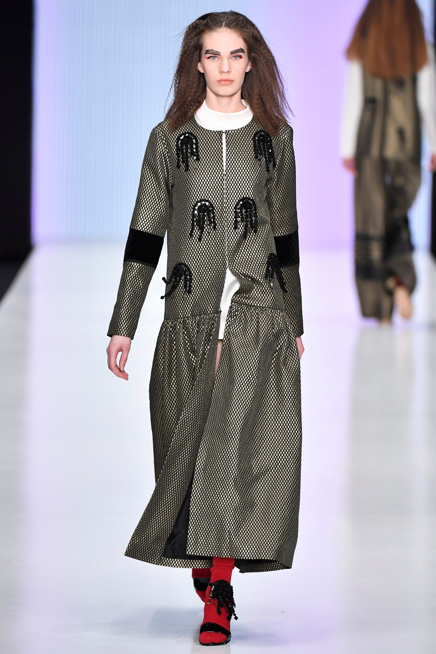 fitted black and gold coat