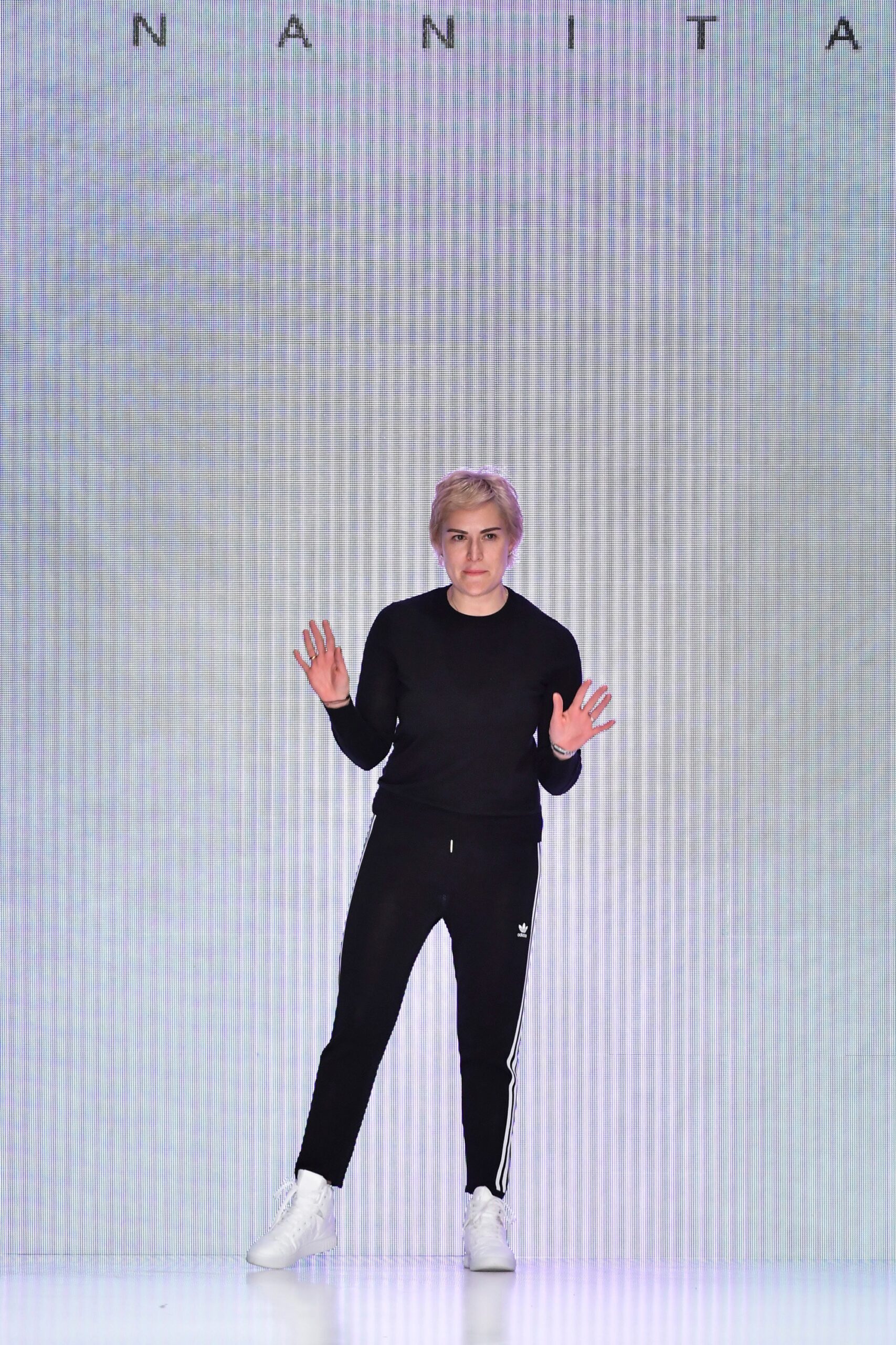 black fitted sweater and pants
