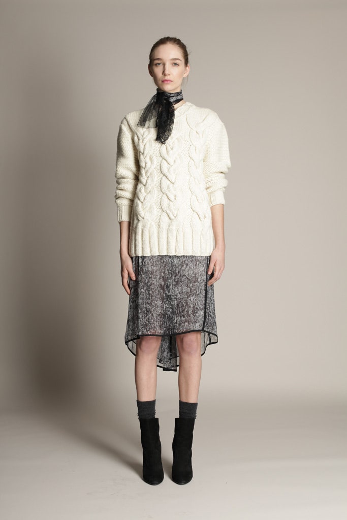white wool cable-knit sweater and black midi dress