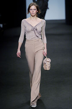 beige silk top with flared pants