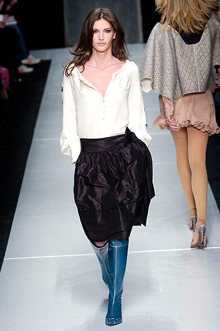 white silk blouse black skirt blue boots