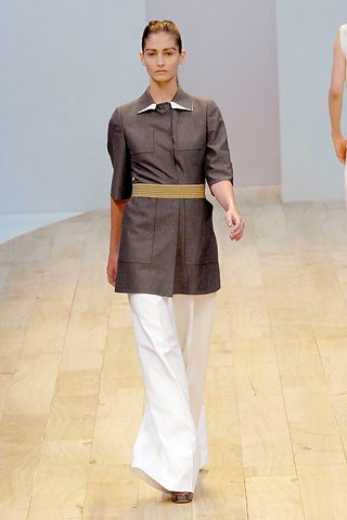 gray blouse with white pants