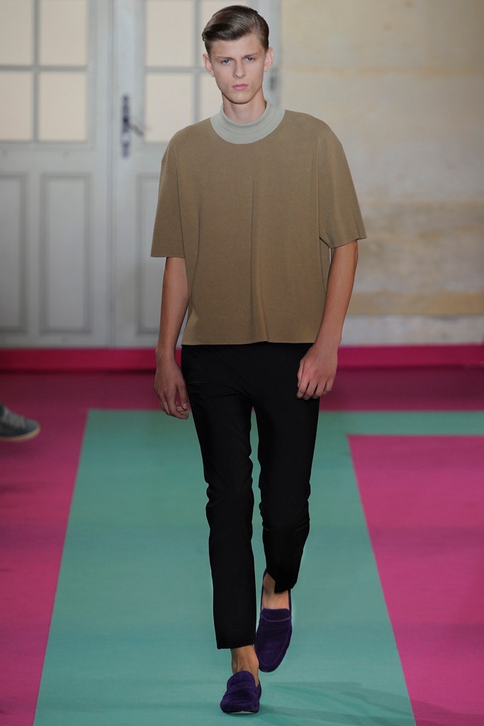 brown relaxed top with black pants