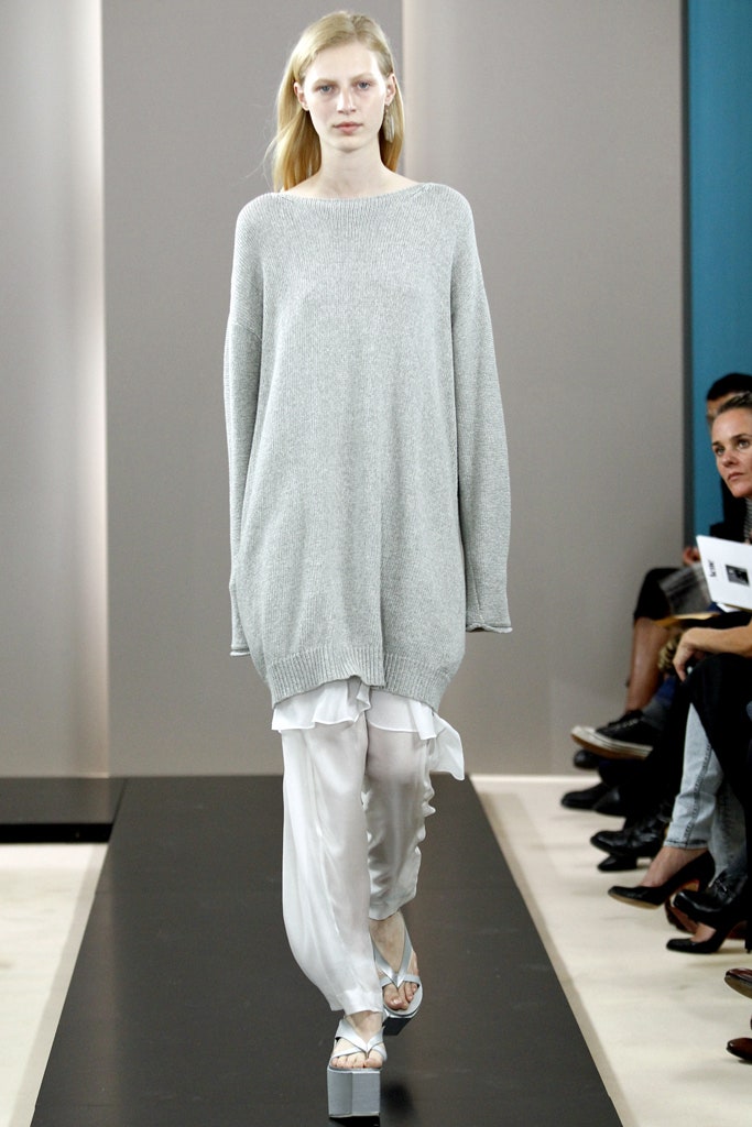 gray oversized sweater with white pants