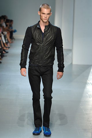 black leather long-sleeve collared fitted zippered jacket