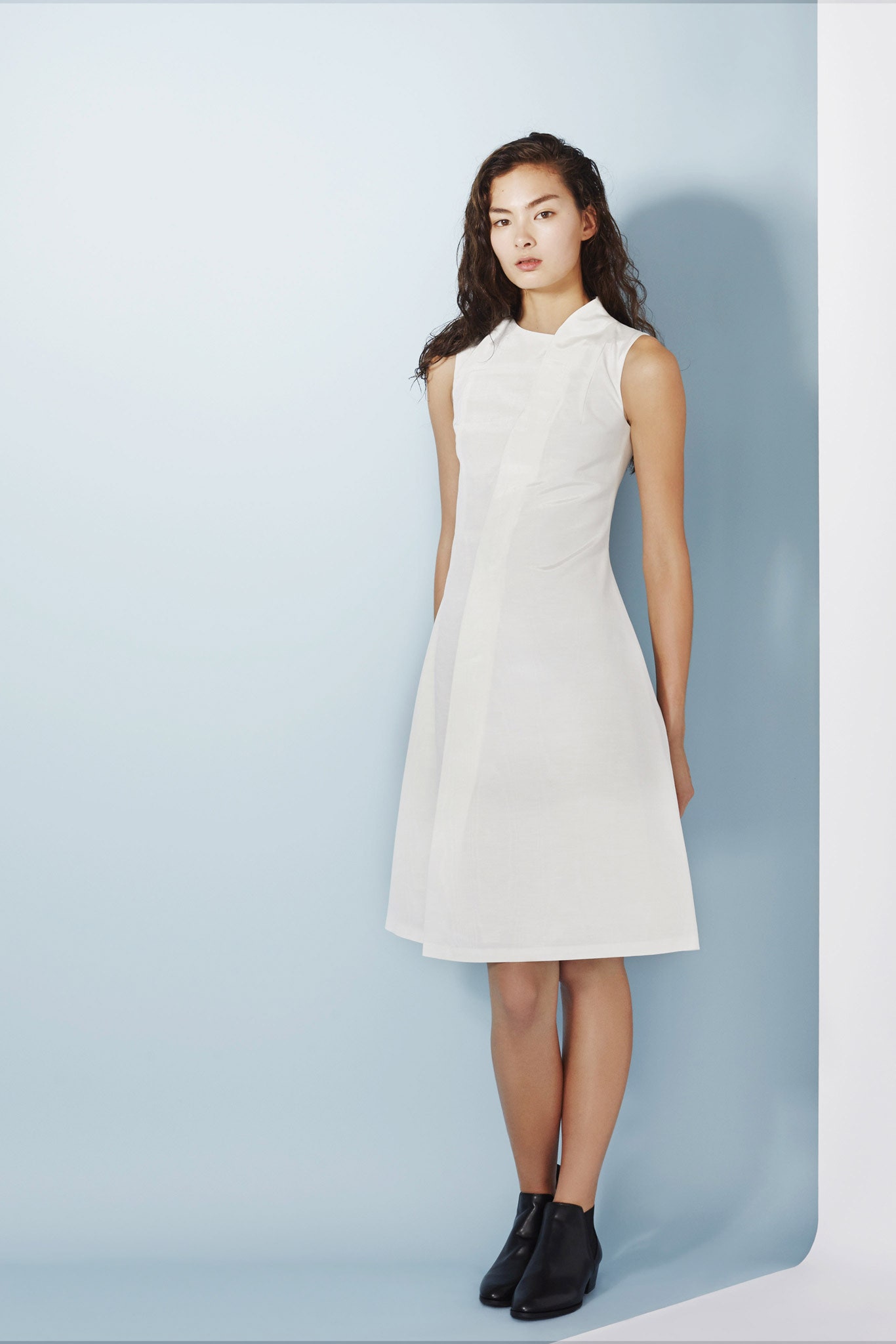 white fitted sleeveless dress