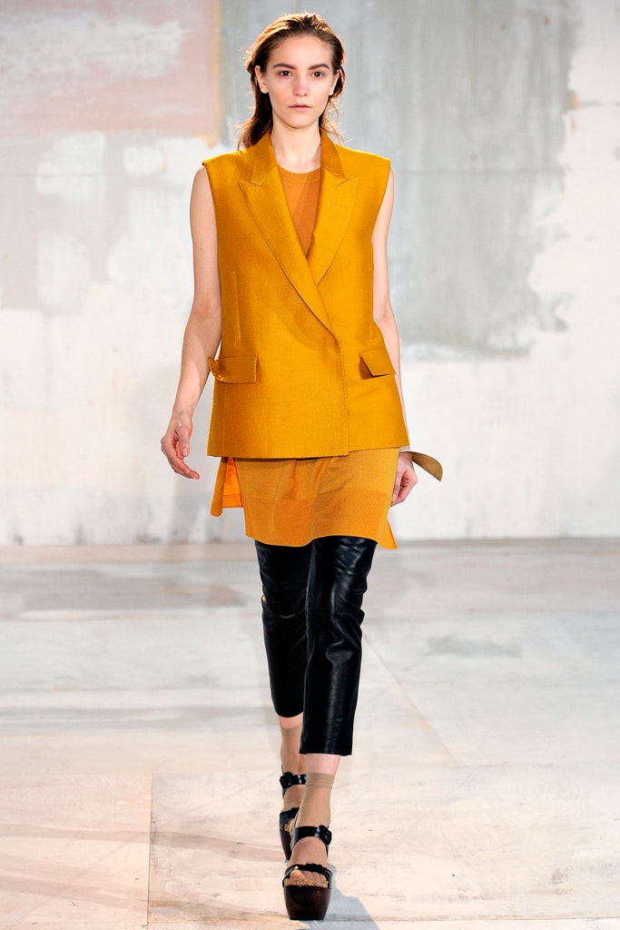 yellow vest with orange top