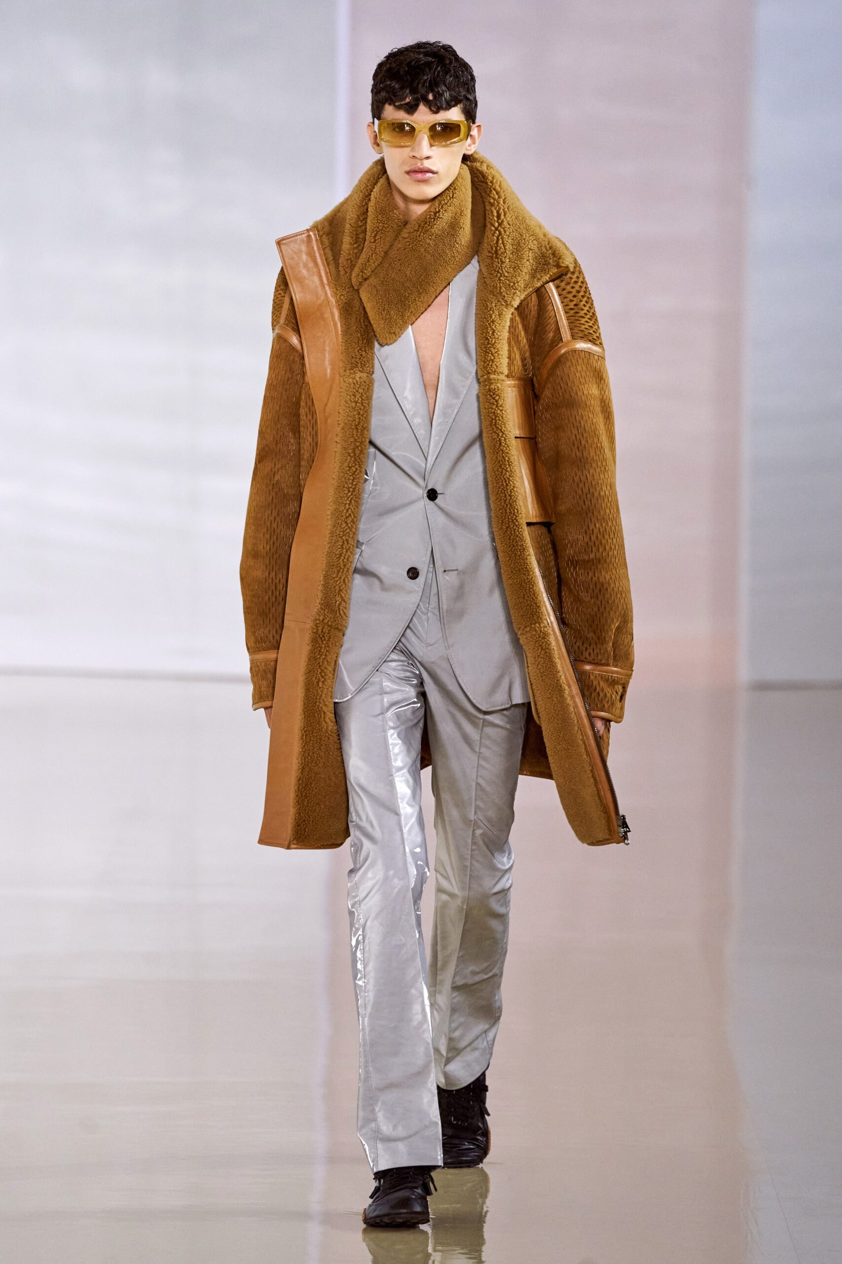 brown coat gray suit metallic pants