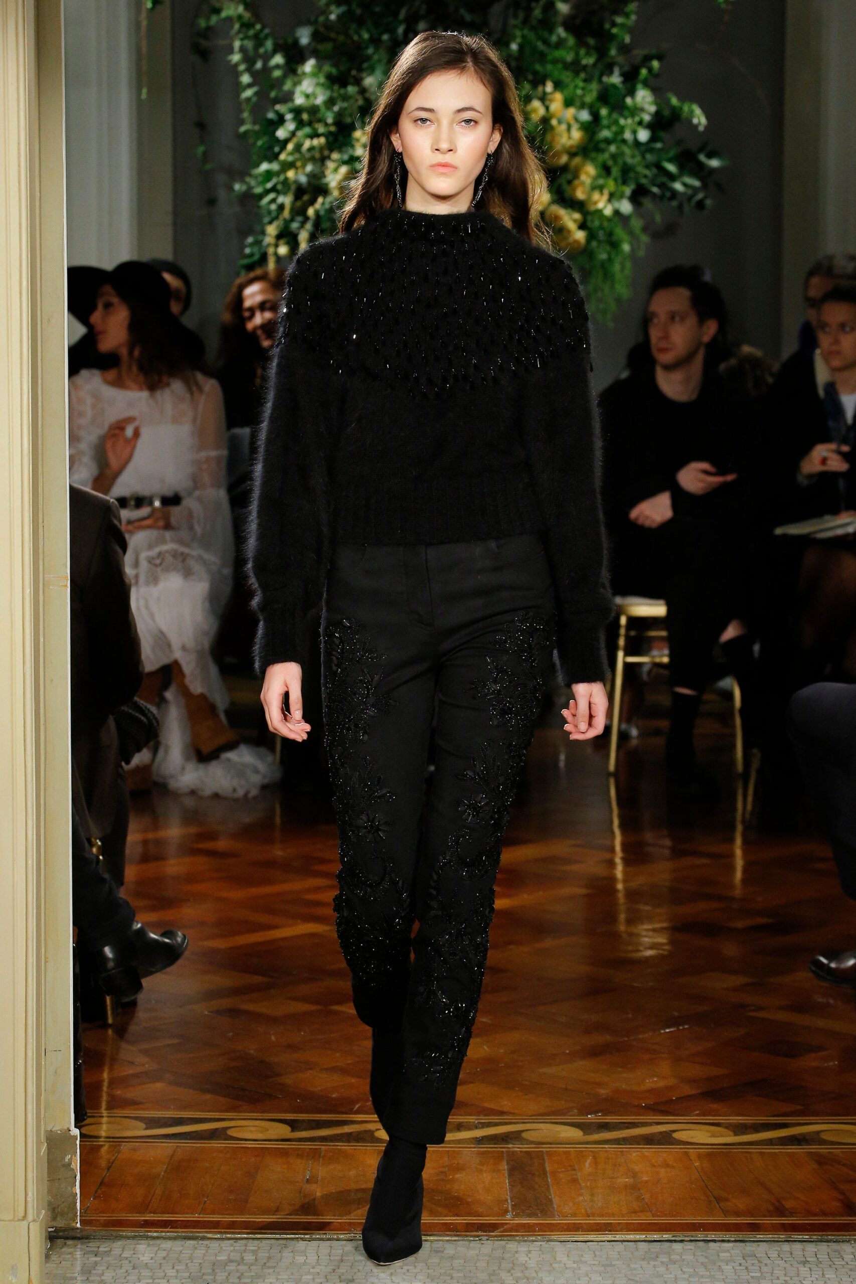 black fitted sweater and pants