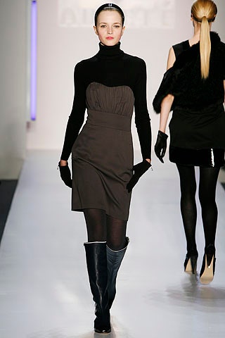 black fitted mini dress with gloves and blue boots