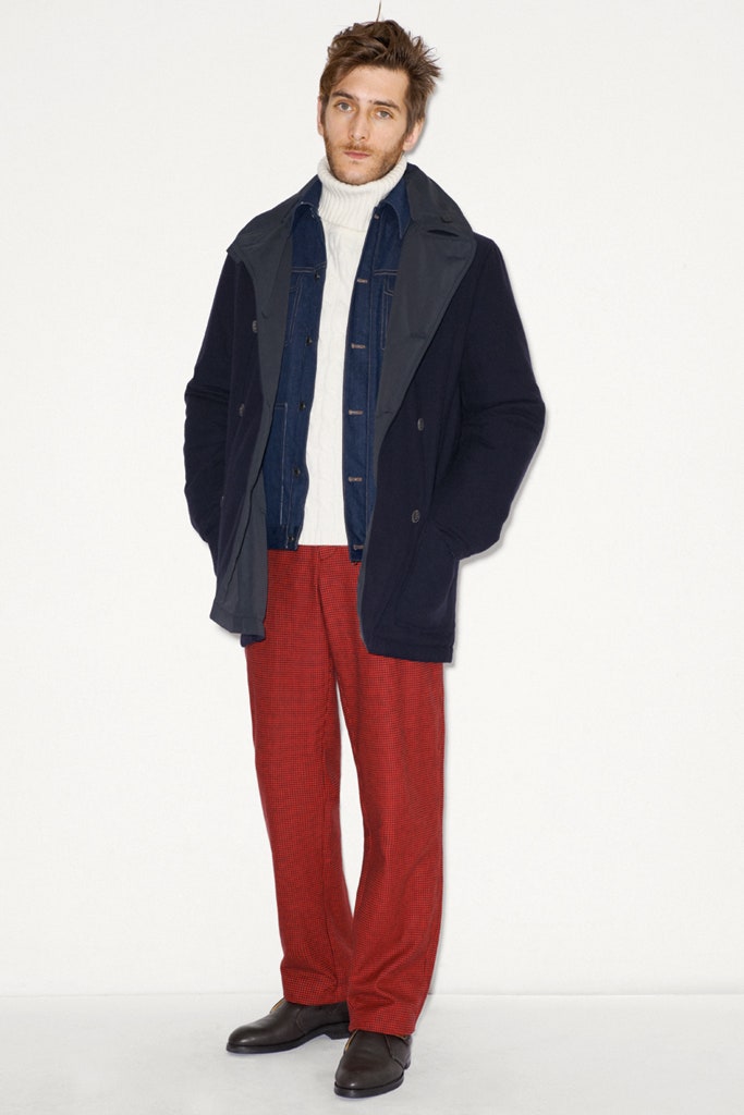 black coat blue jacket white sweater red pants