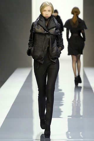 black leather long-sleeve collared fitted zippered jacket