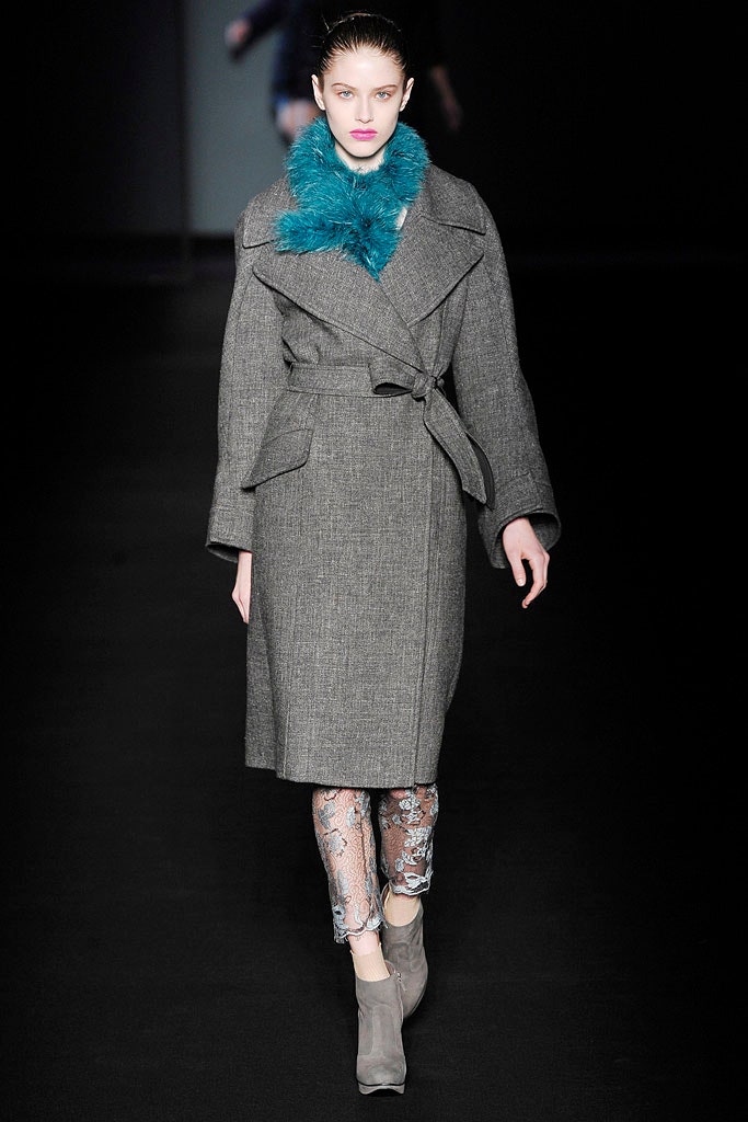 gray tailored coat with teal scarf