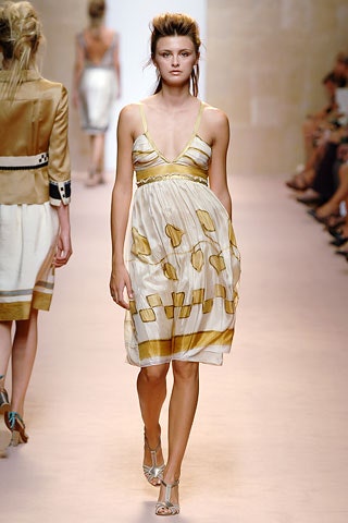 white and gold pleated dress