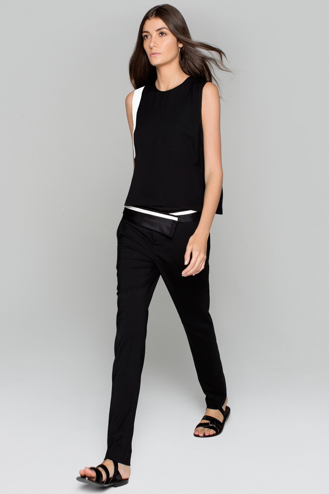 black relaxed top with tailored pants