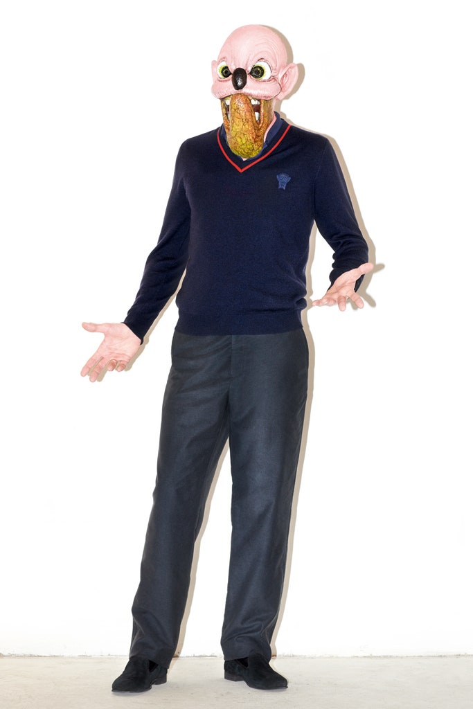 navy fitted sweater and black tailored pants