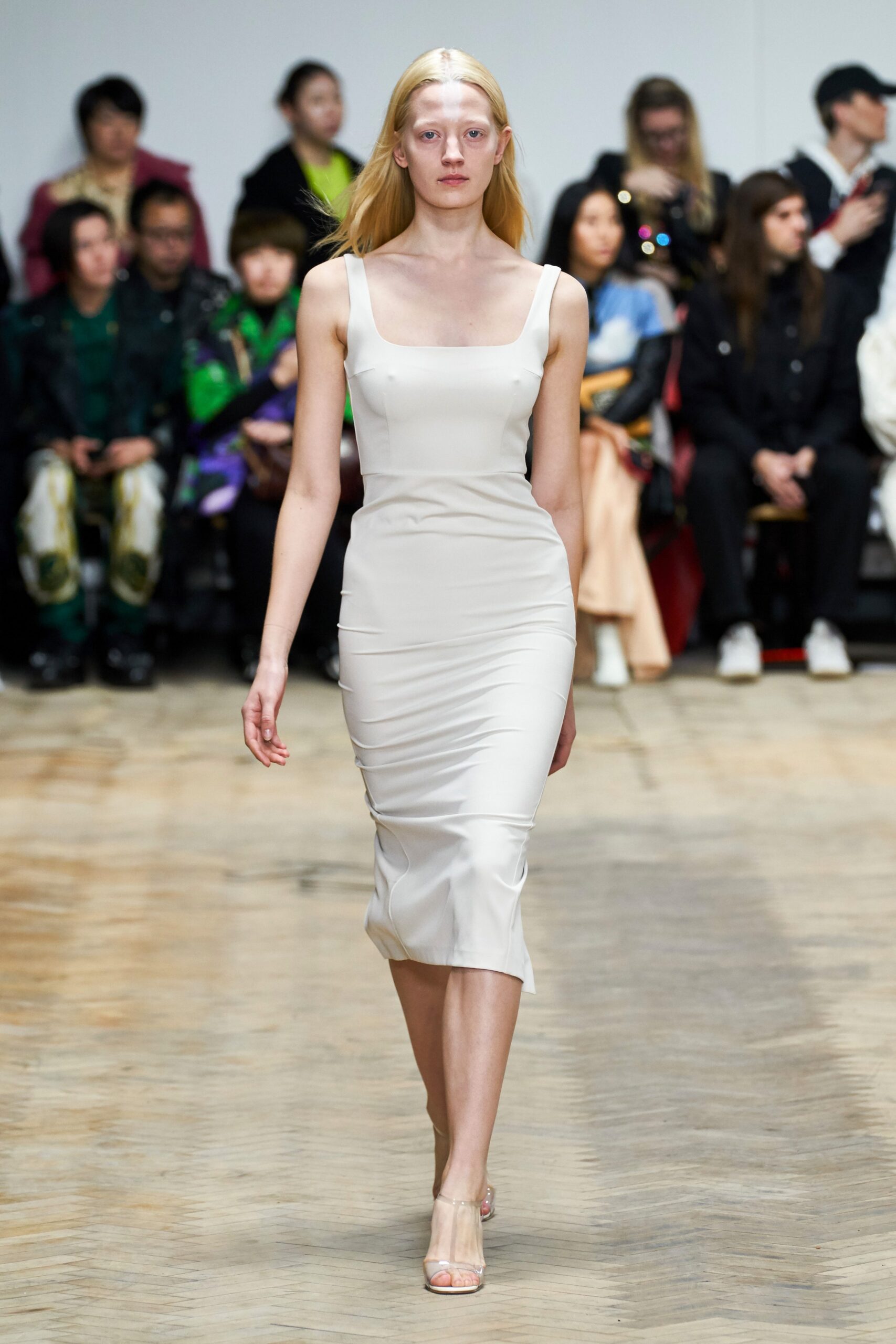 fitted white sleeveless dress