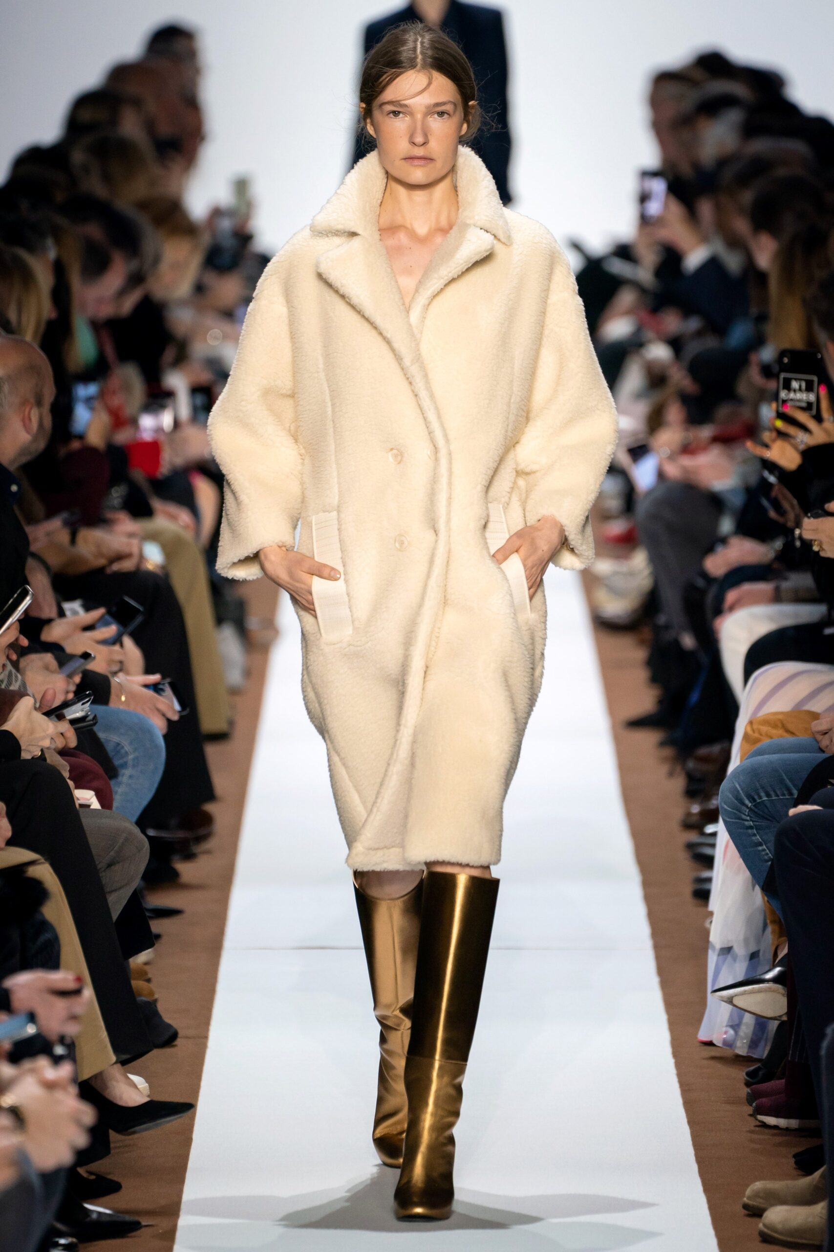 gold leather fitted shiny boots