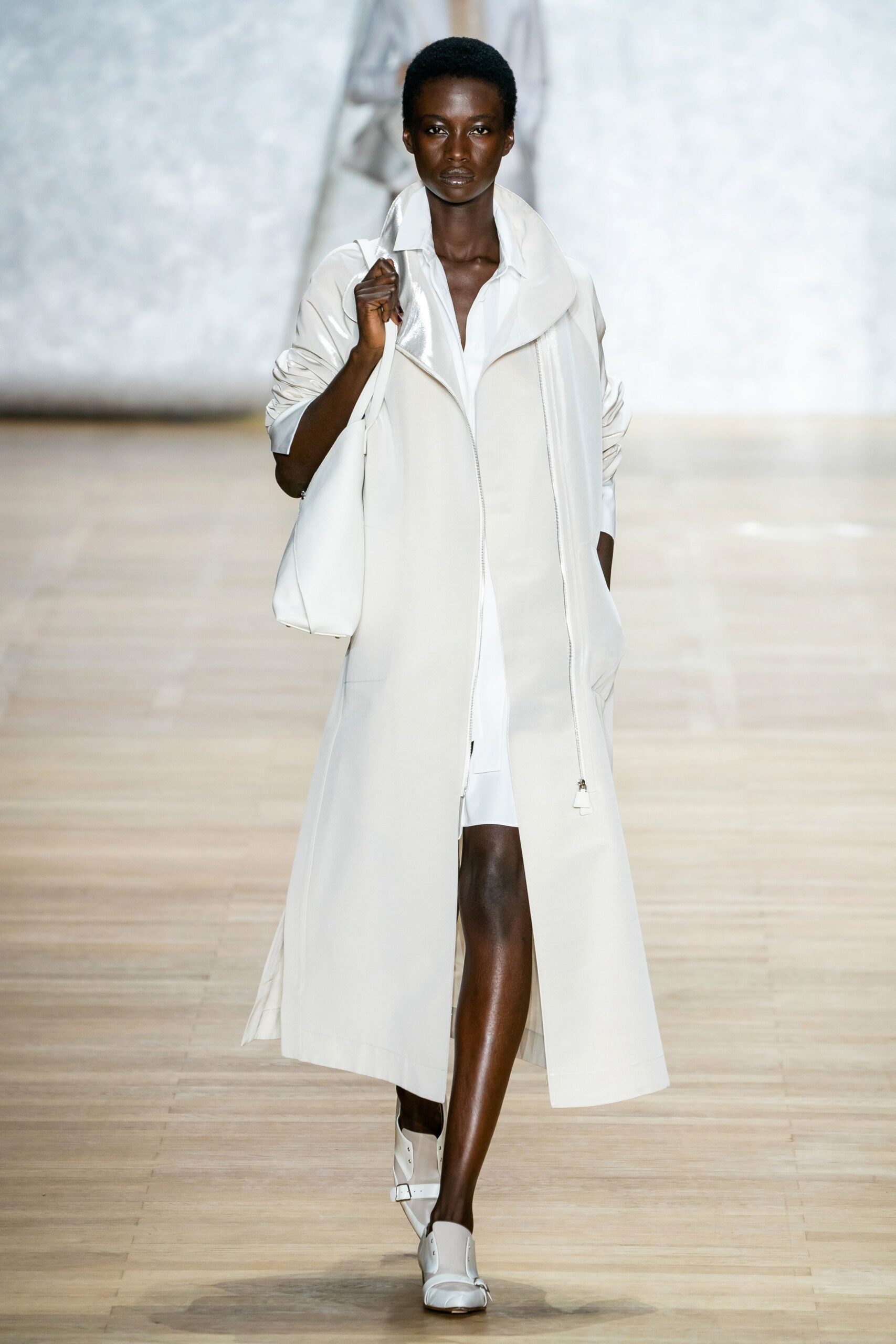 white relaxed coat with mini dress