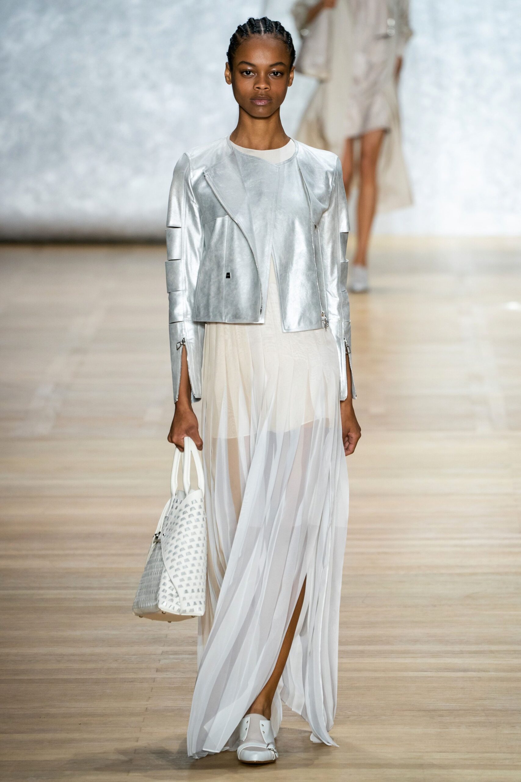 silver fitted jacket and white maxi dress