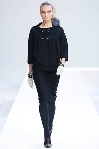 black relaxed top and fitted skirt