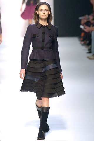 purple fitted jacket with pleated skirt