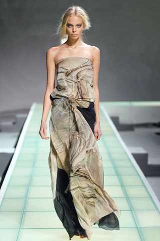 beige and black draped gown