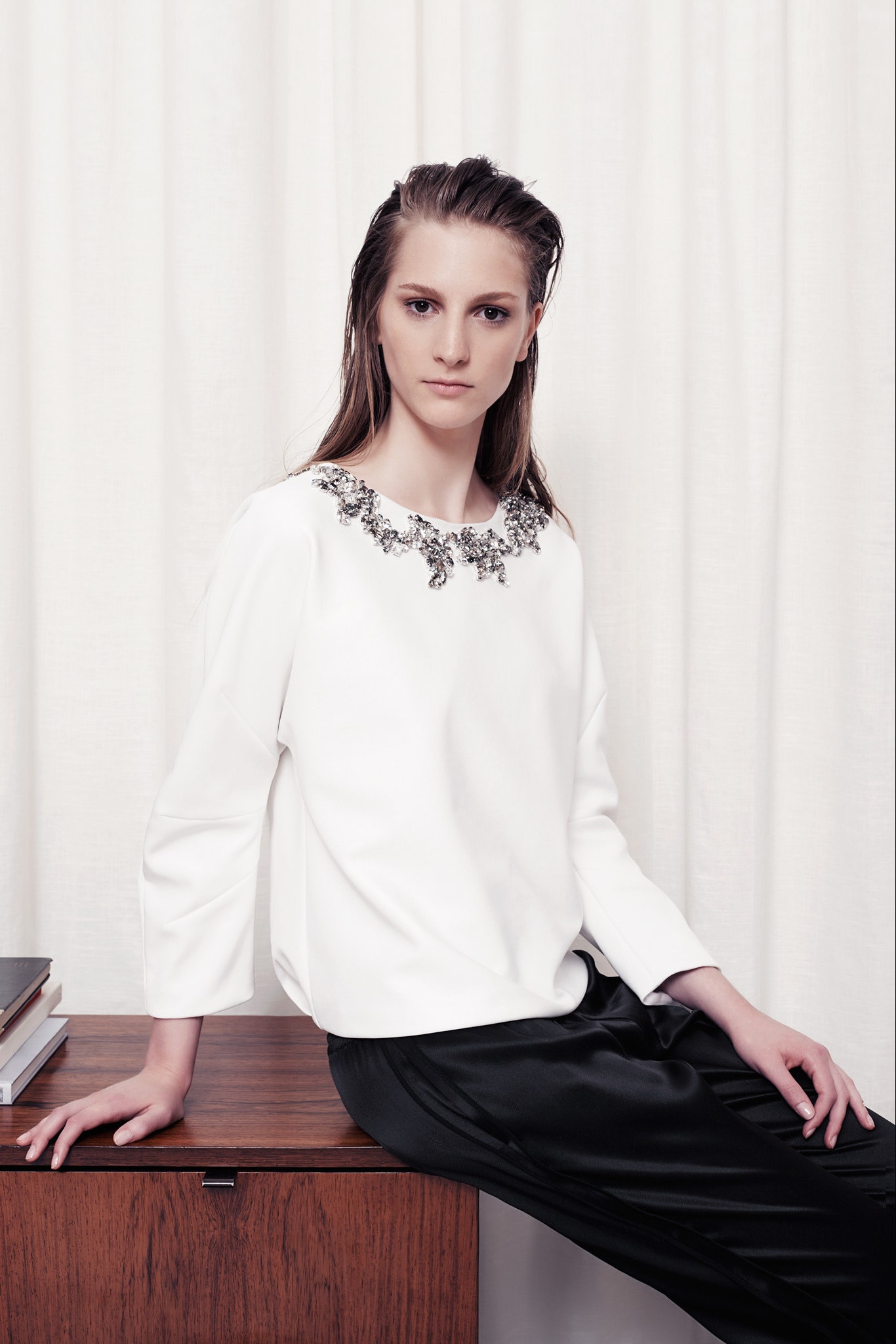 white cotton long-sleeve collared relaxed embellished top