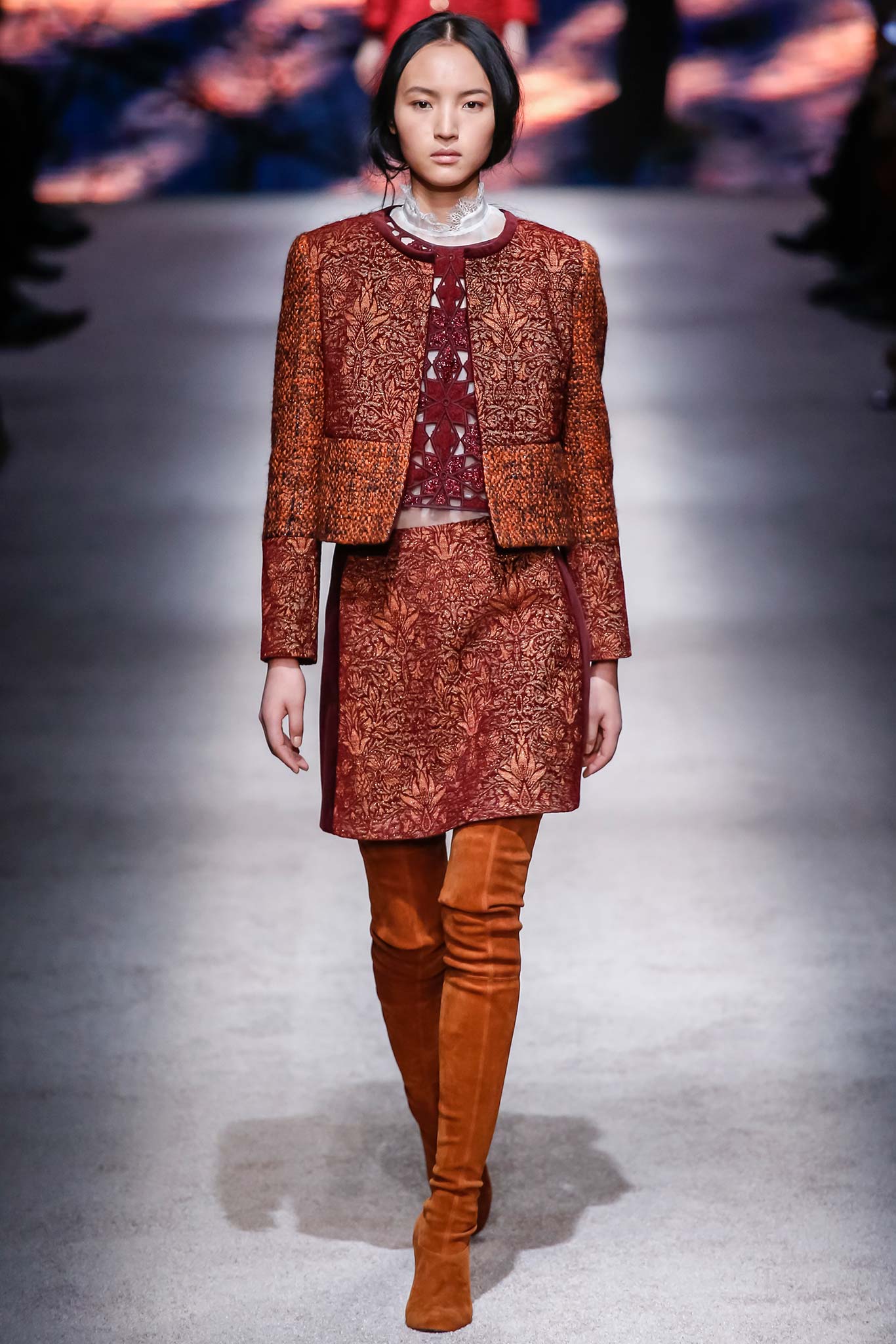 red brown embroidered jacket and skirt