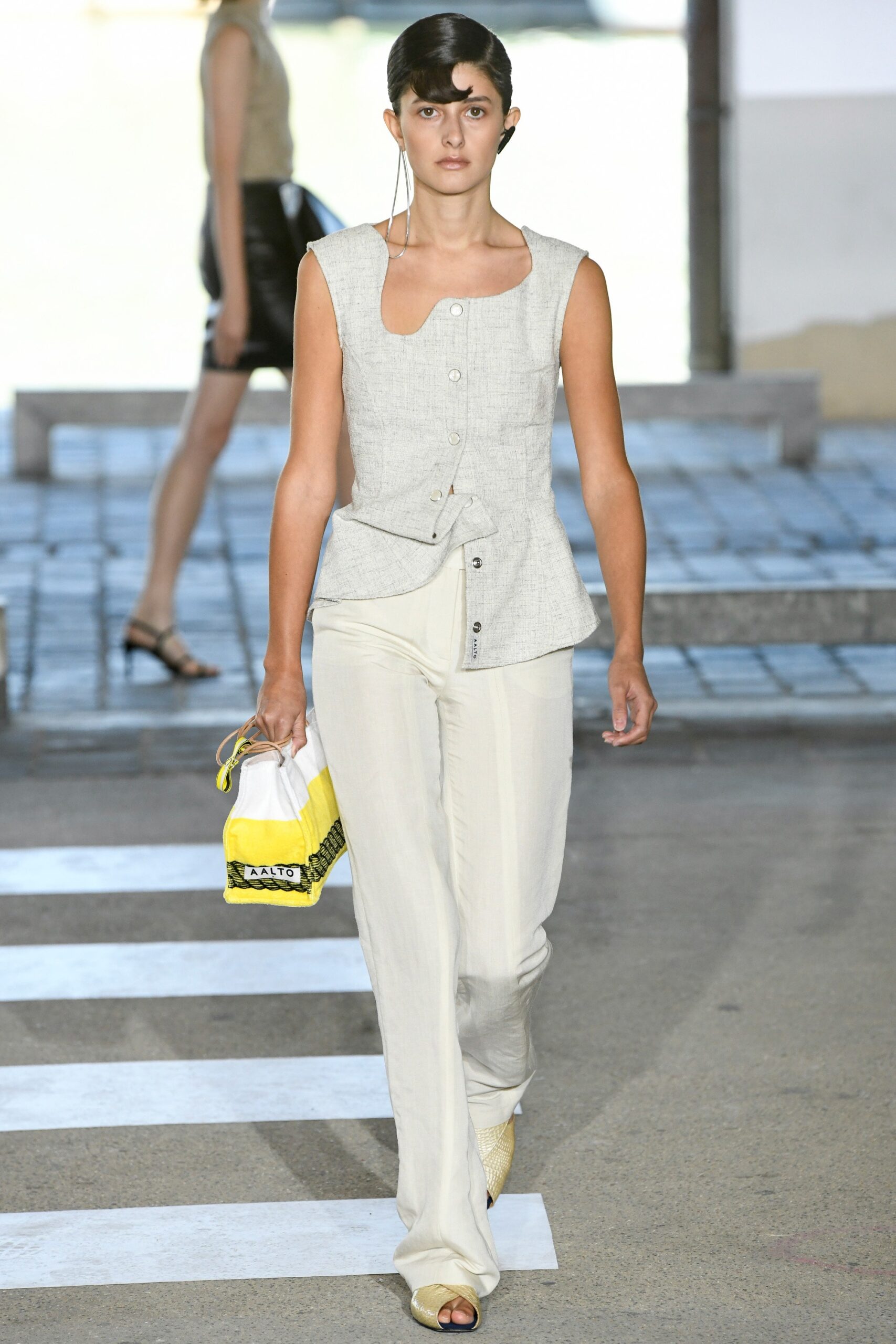beige linen sleeveless top with white pants