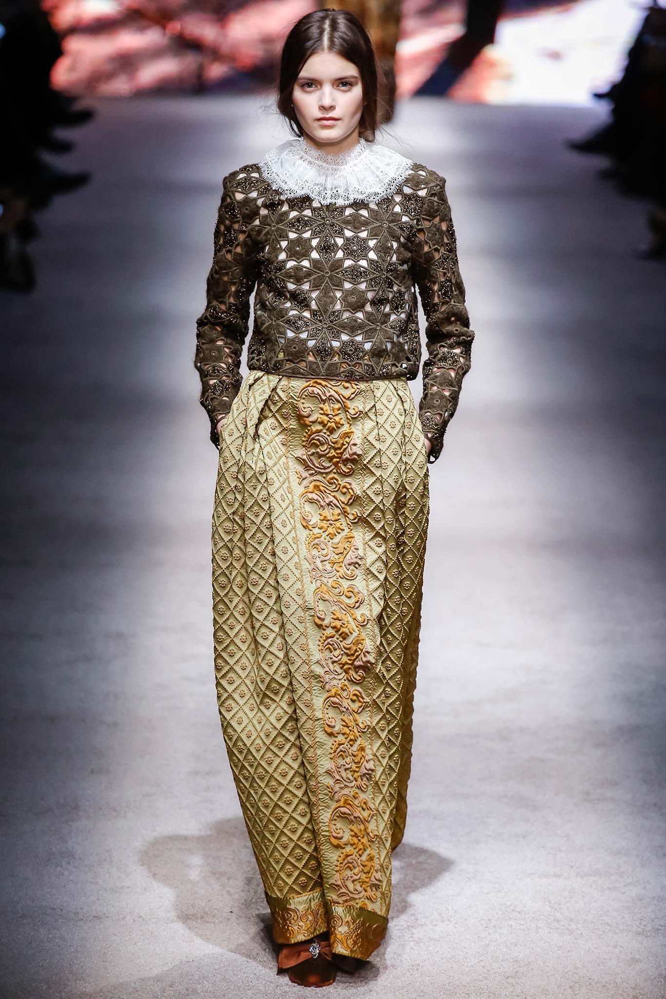 brown lace top with gold pants