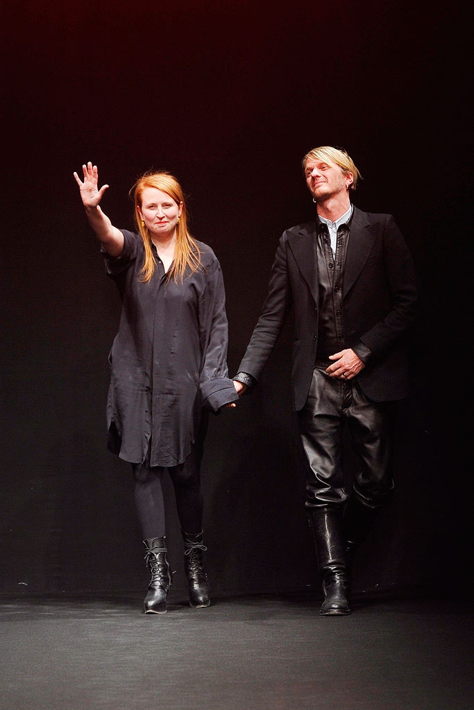 black relaxed dress with leather pants