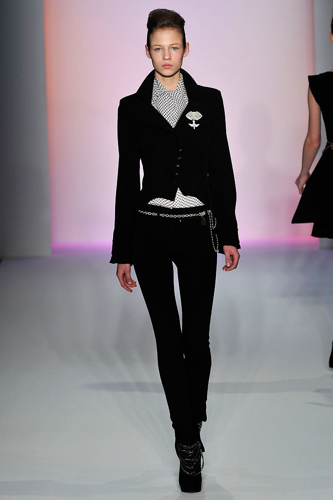 black fitted jacket with polka-dot shirt