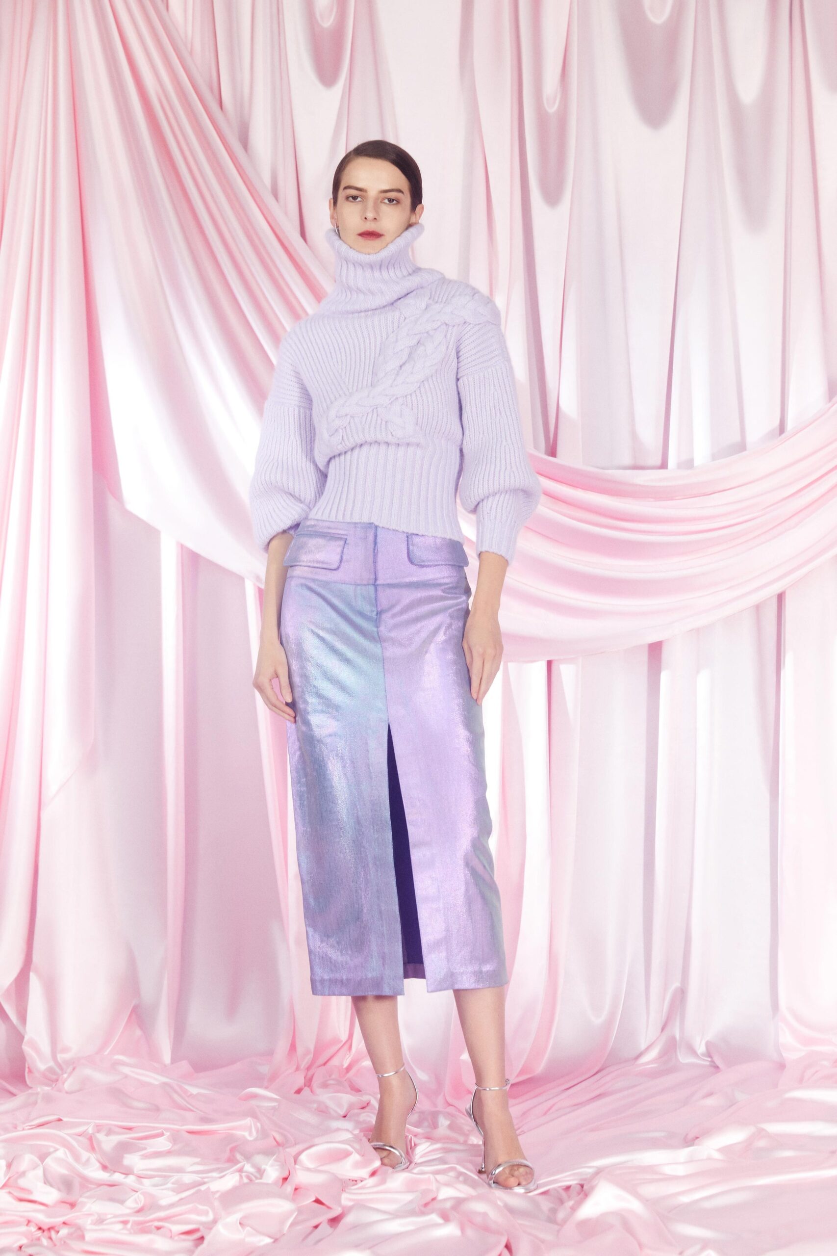 lavender wool sweater and blue vinyl skirt