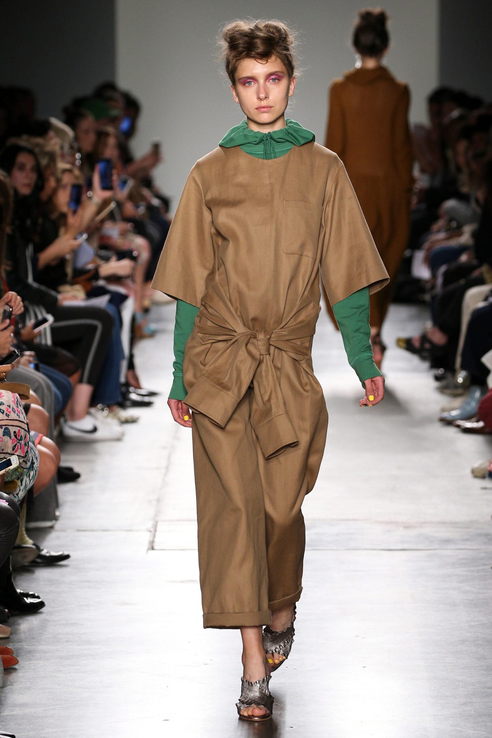 A relaxed brown cotton dress with short sleeves and a belted waist.