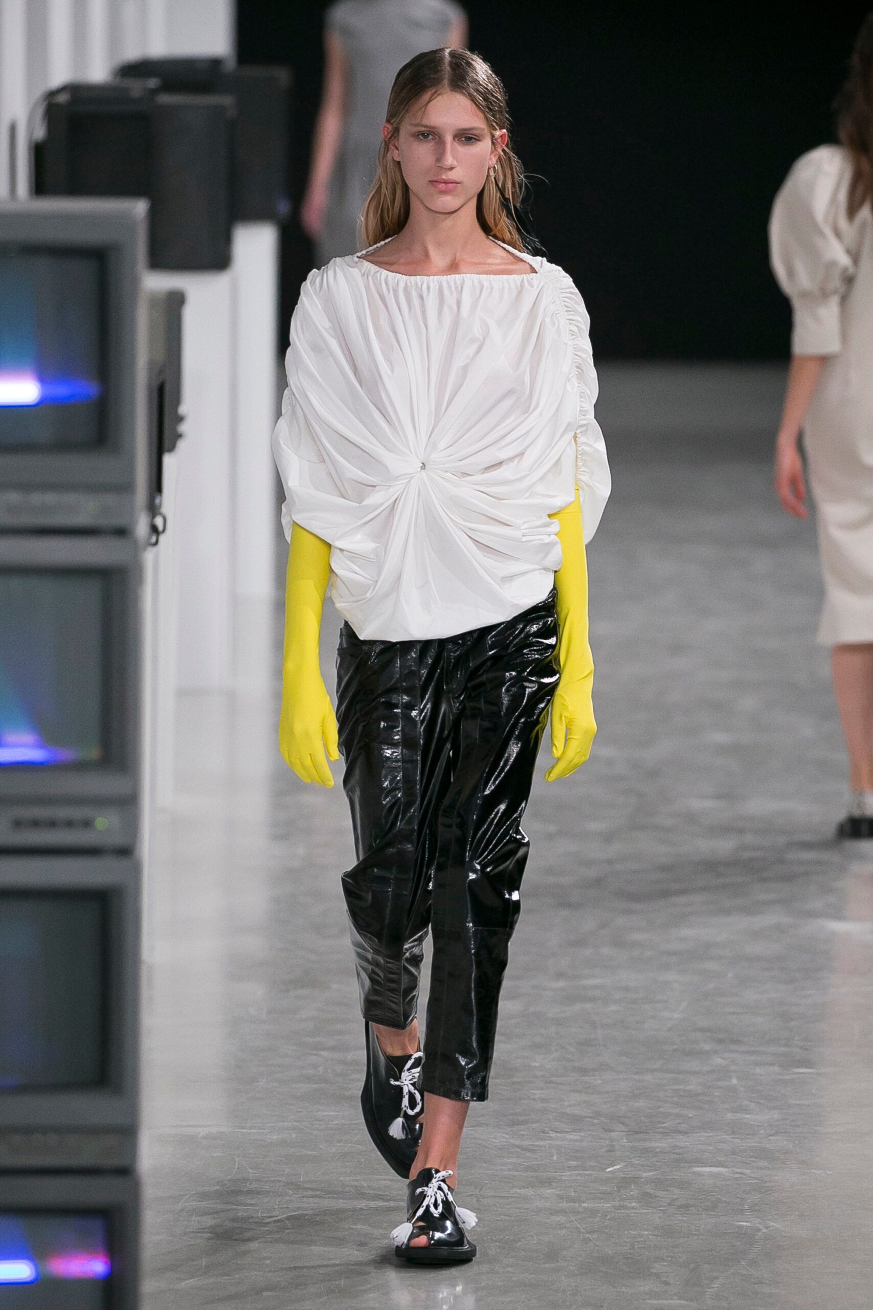 white draped top with black pants
