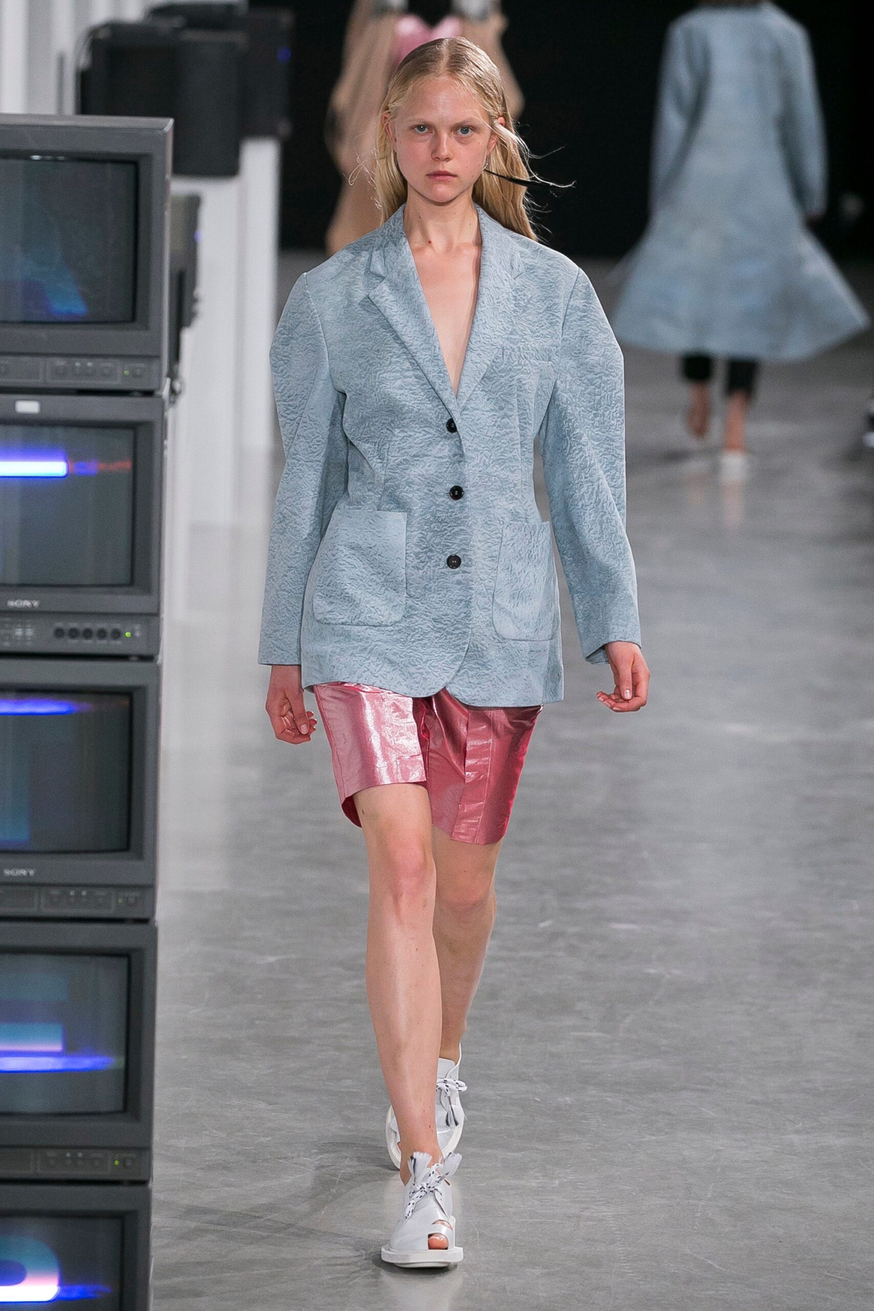 blue cotton blazer with pink shorts