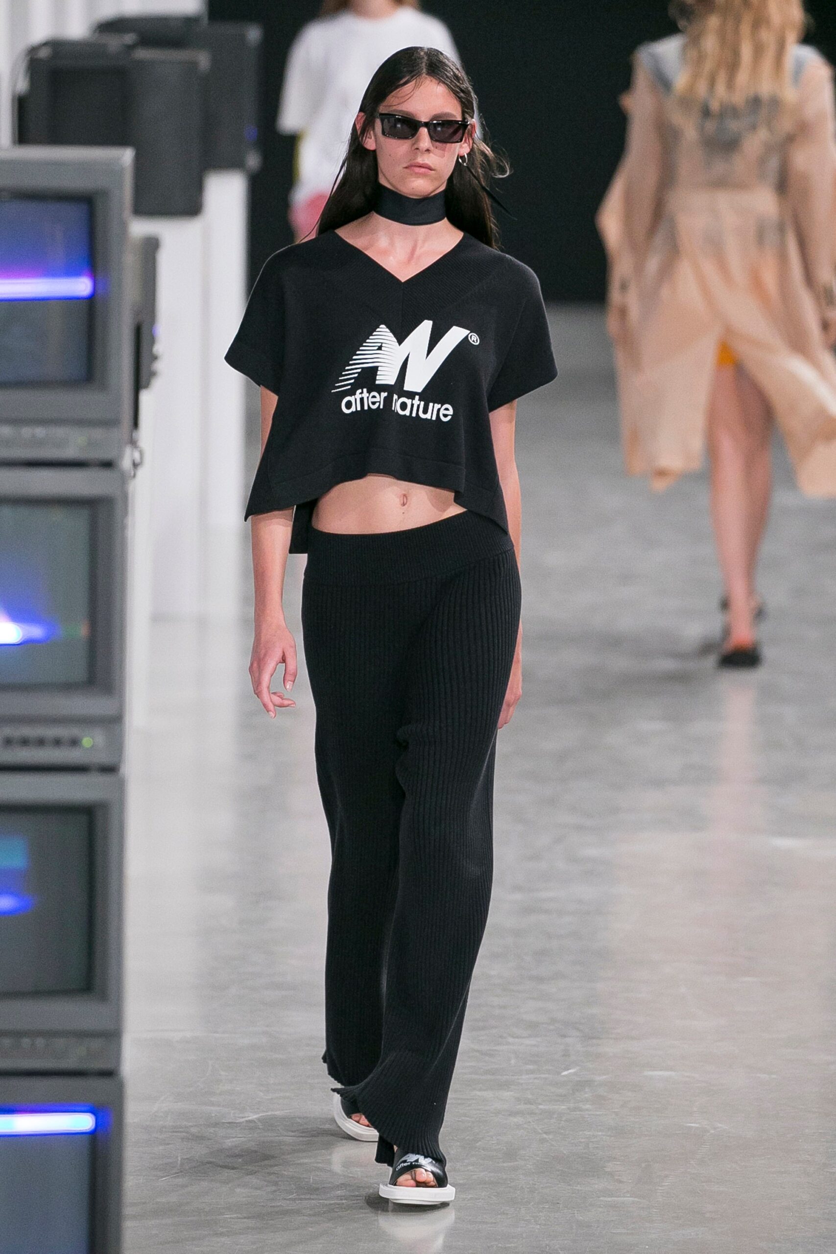 black cropped top and relaxed pants