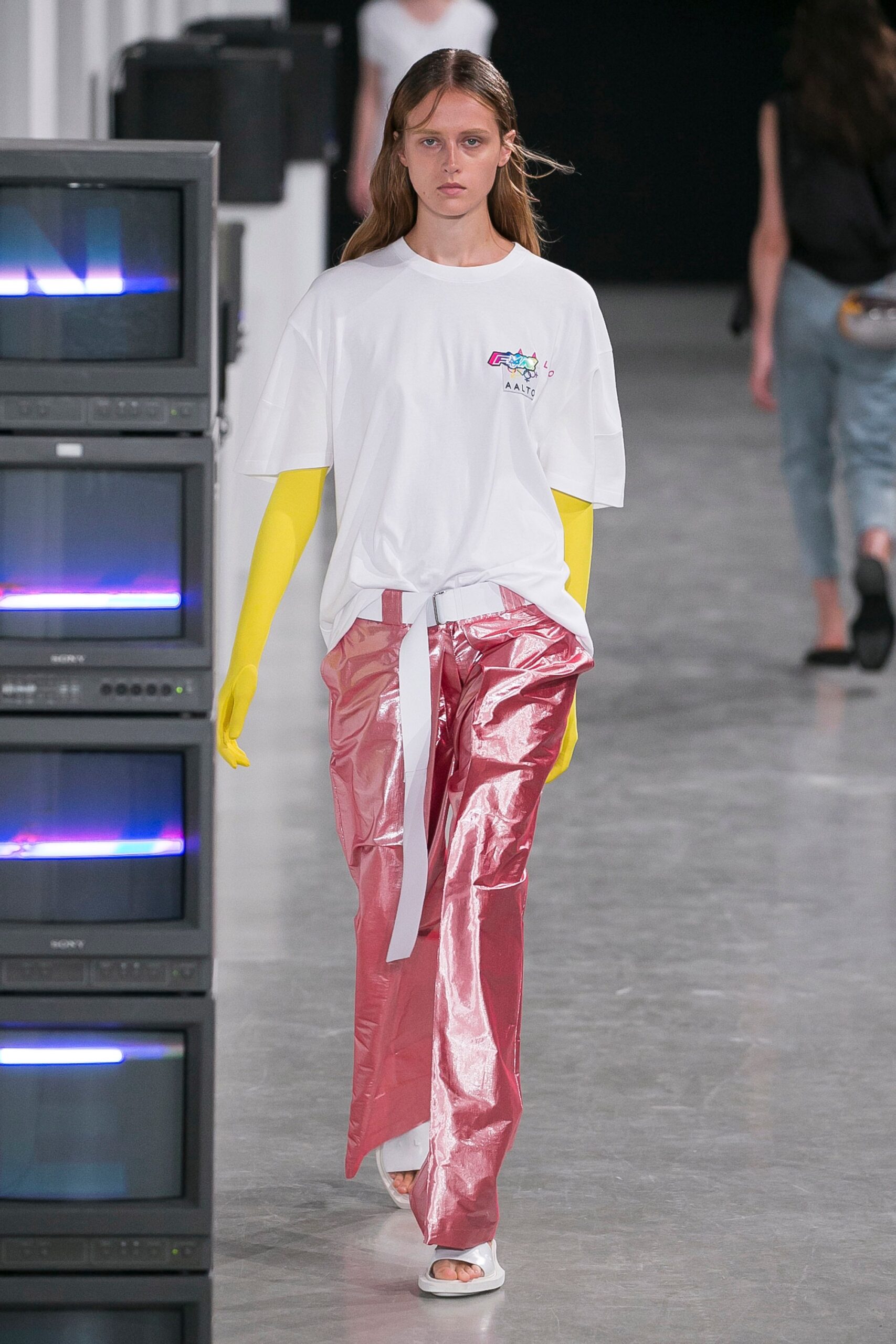 white t-shirt pink vinyl pants