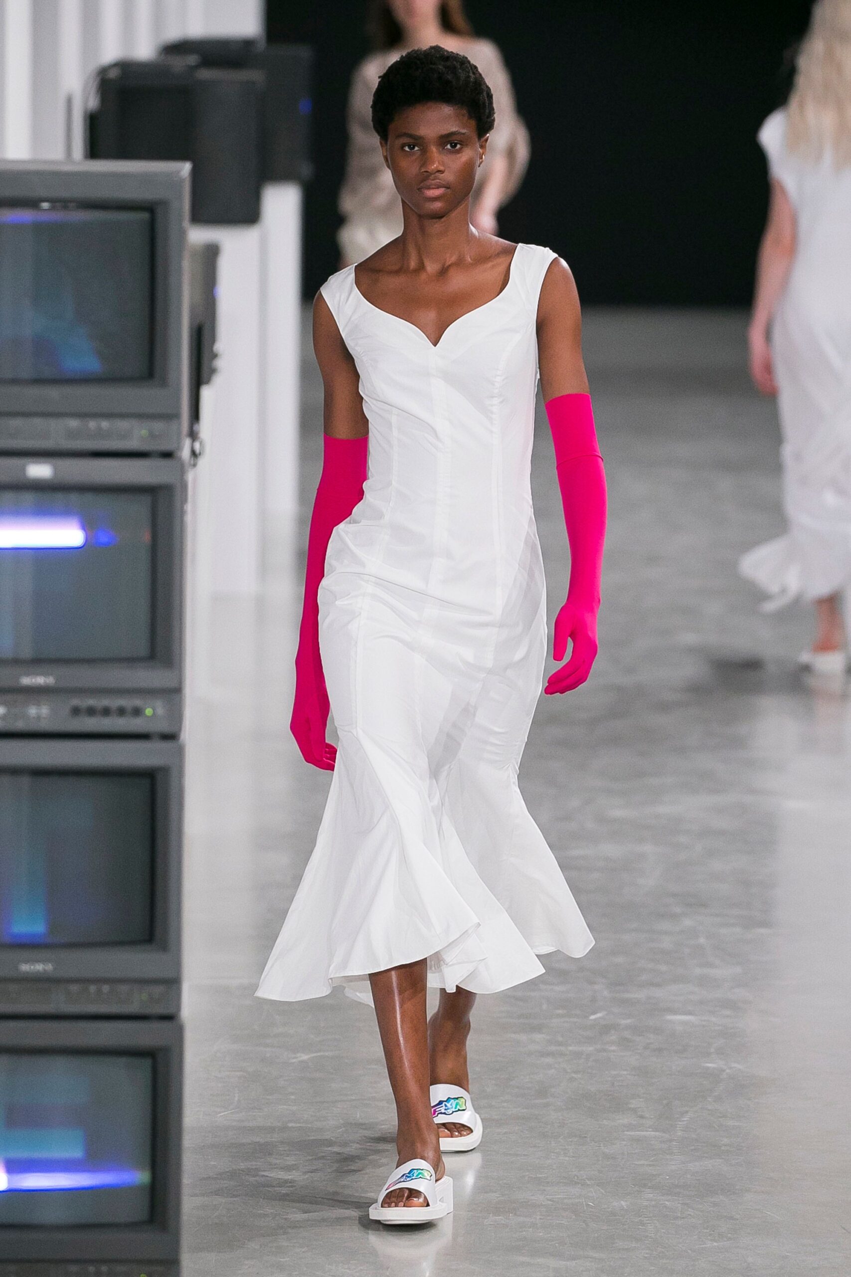 white fitted midi dress with pink gloves