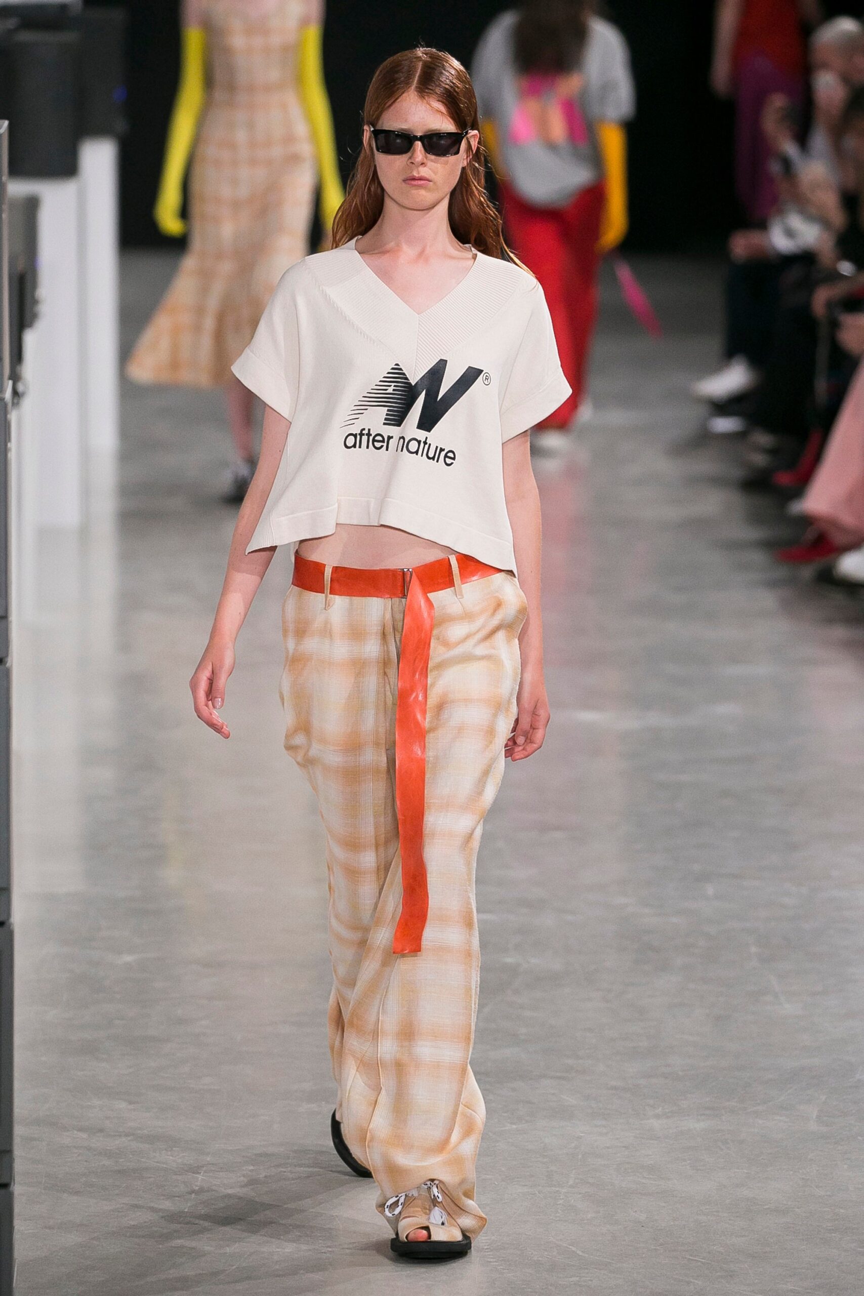 relaxed white top with plaid pants
