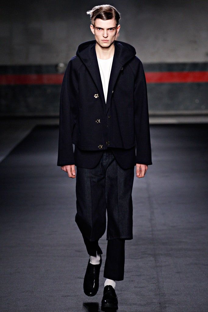 black wool hooded jacket with denim pants